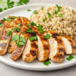 chicken and brown rice plated meal