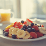 Fresh fruit on waffles for a healthy breakfast
