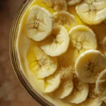 A close-up of banana pudding highlighting what keeps bananas from turning brown in banana pudding.